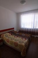 Postel nebo postele na pokoji v ubytování Apartments in Lotos Complex