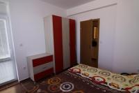 Postel nebo postele na pokoji v ubytování Apartments in Lotos Complex