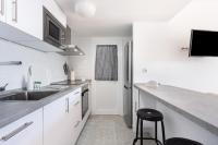 Kuchyň nebo kuchyňský kout v ubytování Home2Book Poris Ocean View