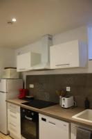 Kuchyňa alebo kuchynka v ubytovaní appartement climatisé + terrasse