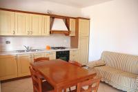 A kitchen or kitchenette at Baia Fiorita