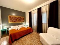 Posteľ alebo postele v izbe v ubytovaní Grimaldi Apartments Cannaregio