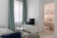 Posteľ alebo postele v izbe v ubytovaní HOMEABOUT Juan de Austria Apartments