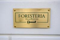 a sign on a wall that reads foresteria villaria problem at Foresteria Villa Puccini Casa per Ferie-Holiday Home in Torre del Lago Puccini