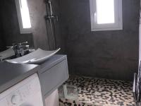 a bathroom with a sink and a washing machine at Villa Port Barcarès, 2 pièces, 4 personnes - FR-1-81-259 in Le Barcarès