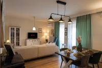 Posteľ alebo postele v izbe v ubytovaní Glyfada golf fourth floor apartment