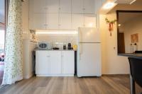 Kuchyňa alebo kuchynka v ubytovaní Glyfada golf fourth floor apartment