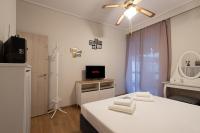 Posteľ alebo postele v izbe v ubytovaní Glyfada golf fourth floor apartment