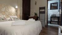 A bed or beds in a room at Angolo Dei Priori - city center-