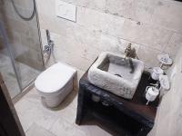 A bathroom at Angolo Dei Priori - city center-