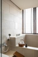 a bathroom with a sink and a shower at Beitou Sweet Me Hot Spring Resort in Taipei