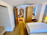 Łóżko lub łóżka w pokoju w obiekcie Chalet Augustine Hinterglemm Zentrum