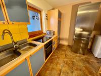 Kuchnia lub aneks kuchenny w obiekcie Chalet Augustine Hinterglemm Zentrum