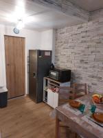 Kuchnia lub aneks kuchenny w obiekcie Appartement comme à la maison