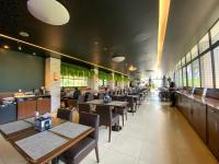 En restaurant eller et andet spisested på Flat Centro de Brasilia