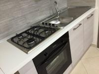 Kuchyňa alebo kuchynka v ubytovaní Apartments Casa Vacanze Dante