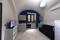 Kuchyňa alebo kuchynka v ubytovaní Apartments Casa Vacanze Dante