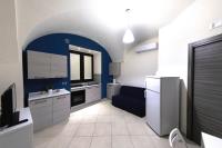 Televízia a/alebo spoločenská miestnosť v ubytovaní Apartments Casa Vacanze Dante