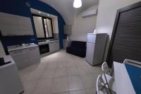 Kuchyňa alebo kuchynka v ubytovaní Apartments Casa Vacanze Dante