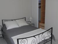 Posteľ alebo postele v izbe v ubytovaní Charmant F2 avec balcon et parking, proche cure et centre-ville – Amélie-les-Bains - FR-1-703-84