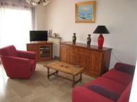 Televízia a/alebo spoločenská miestnosť v ubytovaní Appartement F3 avec terrasse, parking, Wi-Fi - Idéal cures - Centre-ville Amélie-les-Bains - FR-1-703-87