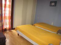 Posteľ alebo postele v izbe v ubytovaní Appartement F3 avec terrasse, parking, Wi-Fi - Idéal cures - Centre-ville Amélie-les-Bains - FR-1-703-87