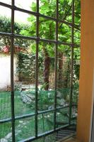A garden outside Appartamento Maggiore