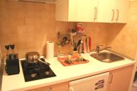 A kitchen or kitchenette at Appartamento Maggiore