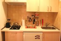 A kitchen or kitchenette at Appartamento Maggiore