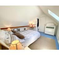 Posteľ alebo postele v izbe v ubytovaní Appartement duplex hyper bien placé plages à 2 pas Carnac plage