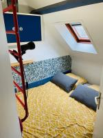 Posteľ alebo postele v izbe v ubytovaní Appartement duplex hyper bien placé plages à 2 pas Carnac plage