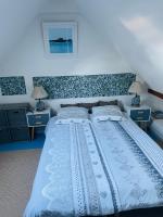 Posteľ alebo postele v izbe v ubytovaní Appartement duplex hyper bien placé plages à 2 pas Carnac plage
