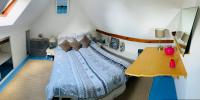 Posteľ alebo postele v izbe v ubytovaní Appartement duplex hyper bien placé plages à 2 pas Carnac plage