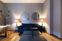 A seating area at Elegant Sempione Apartment