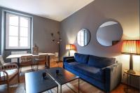 A seating area at Elegant Sempione Apartment