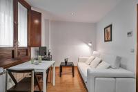 A seating area at Deluxe Apartment Granada