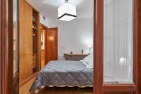 A bed or beds in a room at Deluxe Apartment Granada