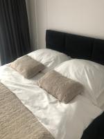 Posteľ alebo postele v izbe v ubytovaní Apartment by Gustav