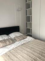 Posteľ alebo postele v izbe v ubytovaní Apartment by Gustav