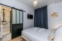 Posteľ alebo postele v izbe v ubytovaní MBA Splendide Appart - Le Raincy - Banlieue Paris