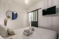 Posteľ alebo postele v izbe v ubytovaní MBA Splendide Appart - Le Raincy - Banlieue Paris