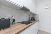 Kuchyňa alebo kuchynka v ubytovaní MBA Splendide Appart - Le Raincy - Banlieue Paris