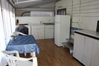 Kuchyňa alebo kuchynka v ubytovaní PS-Caravaning auf Union Lido - Wohnwagenvermietung