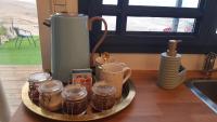 Sun, Mountain & Adventureにあるコーヒーまたはお茶