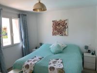 Łóżko lub łóżka w pokoju w obiekcie Villa Sirène-Urlaub in der Provence-Côte d'Azur
