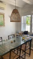 Posezení v ubytování Jávea Villa entière piscine et cuisine d'été à pinosol