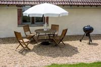 Patio lub wspólna przestrzeń na świeżym powietrzu w obiekcie L'Amelia Les Trois Petites Maisons