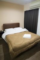Postel nebo postele na pokoji v ubytování Pella Inn Hostel