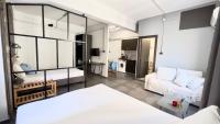 Posteľ alebo postele v izbe v ubytovaní Virginia's Boutique Apartments