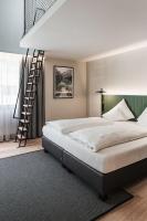 Łóżko lub łóżka w pokoju w obiekcie Stadthotel Goldenes Schiff